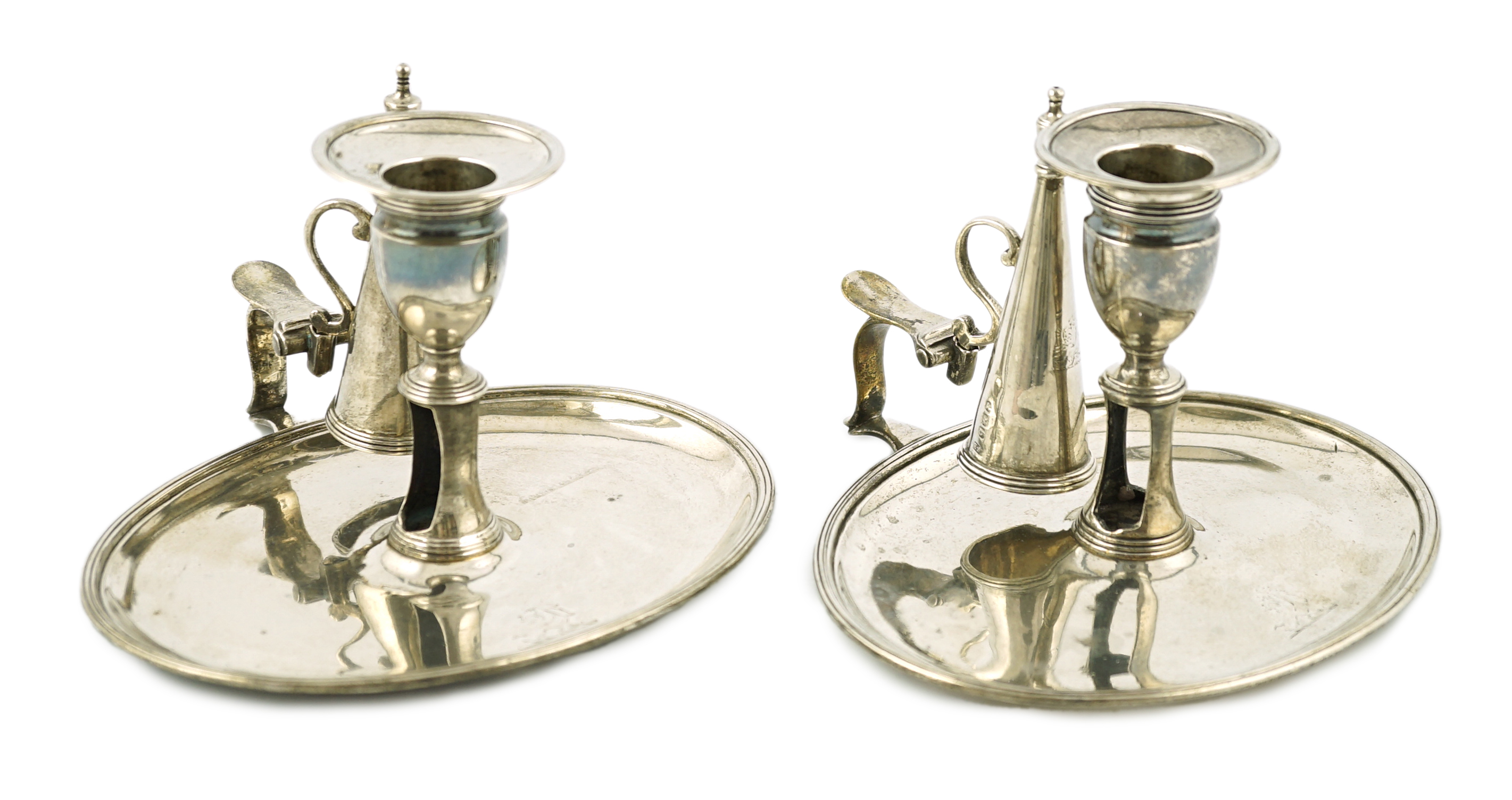 A pair of George III silver chambersticks, by Walter Brind